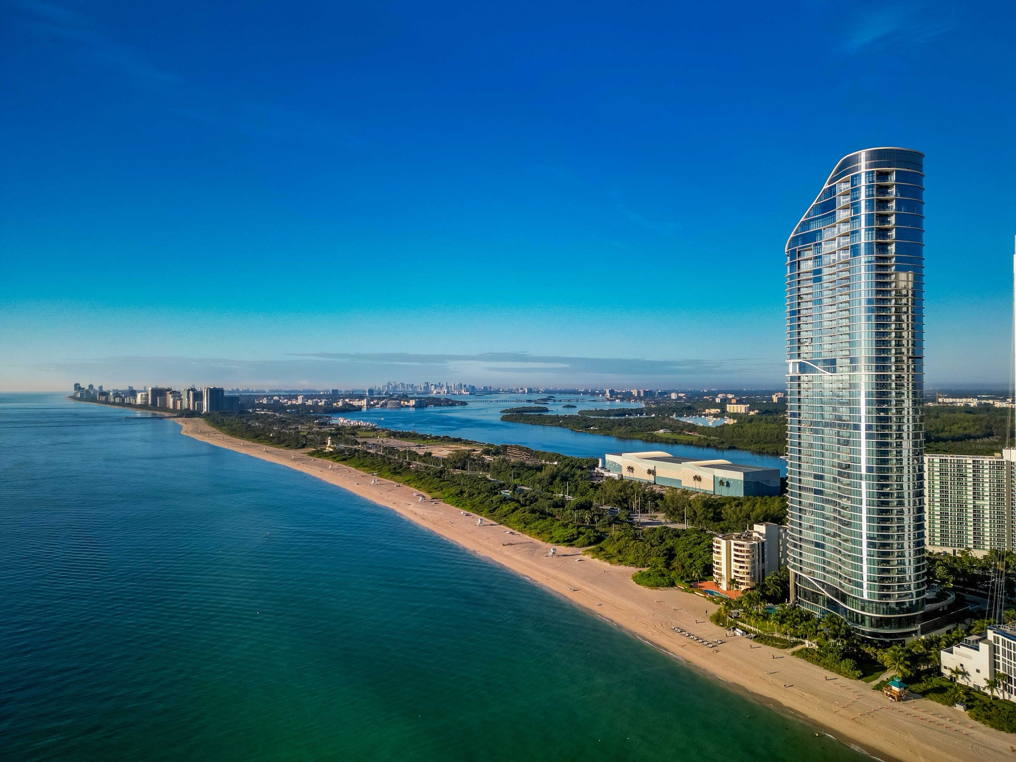 Aerial view of luxury home and pool